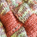 Motley hand knitted wool fabric close up