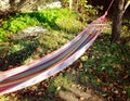 motley multi-colored hammock in the garden