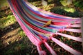 Motley multi-colored hammock in the garden