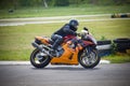 Moto-athlete begins to race on the racetrack