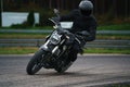 Moto-athlete on the racetrack. Motorcycle sport. No logo or brand names. No any intelectual property