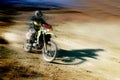 Moto racer in movement Royalty Free Stock Photo