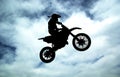 Moto racer in sky Royalty Free Stock Photo