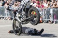 Moto-show in central square of city. Tricks on ATV stuntmen, Stunt man motorbike Riding - Wheelie, Stoppie and extreme acrobatics Royalty Free Stock Photo