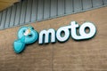 Moto sign including logo on brick wall at motorway freeway service station rest stop area Royalty Free Stock Photo