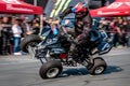 Moto stunt-riding quad bike Royalty Free Stock Photo
