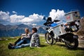 Moto travellers with motocycle in Switzerland Alps Royalty Free Stock Photo