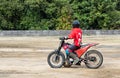 Motoball, man rides a motorcycle and drives a ball with him, close-up, game