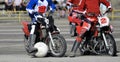 Motoball, players play motoball on motorcycles with a ball, two players