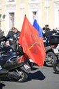 Motobike with flags of Russia and St. Petersburg on a sunny day Royalty Free Stock Photo