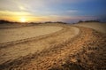 Motocross and auto sport track with sunset sky background. Royalty Free Stock Photo