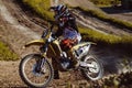 Motocross bike in a race representing concept of speed and power in extreme man sport Royalty Free Stock Photo