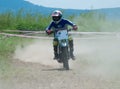 Motocross bike racer in high speed leaving all behind.