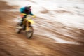 Motocross bike rider in motion Royalty Free Stock Photo