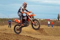 Motocross bike wheelie on the track Royalty Free Stock Photo