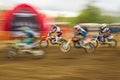 Motocross competition bike rider in motion Royalty Free Stock Photo