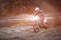 Motocross, enduro rider on dirt track. Extreme off-road race. Hard enduro motorbike. The forest behind him. Royalty Free Stock Photo