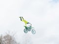 Motocross freestyle rider One Hand Tail Grab jump Royalty Free Stock Photo