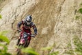 Motocross. Motorcyclist rushes along a dirt road.