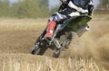 Motocross racer accelerating speed in track Royalty Free Stock Photo