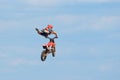 Motocross racer performs a jump