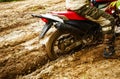 The man on a motorcycle rides through the mud Royalty Free Stock Photo