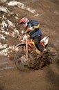 Motocross racer is turning in gauge line with Royalty Free Stock Photo