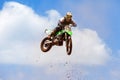 Motocross rider and bike clearing a tabletop jump Royalty Free Stock Photo