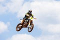 Motocross rider and bike clearing a tabletop jump Royalty Free Stock Photo