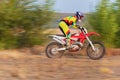 Motocross rider doing a wheelie Royalty Free Stock Photo