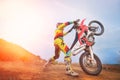 Motocross rider doing a wheelie Royalty Free Stock Photo