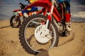 Motocross rider on extreme desert terrain track