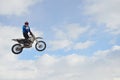 Motocross rider high flight