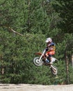 Motocross rider on a motorcycle on the race track in the city of Noyabrsk, Yamalo-Nenets Autonomous District Royalty Free Stock Photo