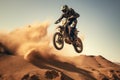 Motocross rider on the race in the desert. Extreme sport, Extreme motocross jumping on the desert sand rear