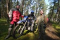 Motocross riders in forest