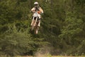 Motocross riders in the jump Royalty Free Stock Photo