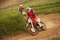 Motocross riders in the jump Royalty Free Stock Photo