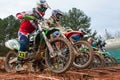 Motocross Riders Lunge Forward At Start Of Race Royalty Free Stock Photo