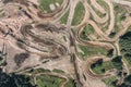 Motocross riders ride on a dust terrain track Royalty Free Stock Photo