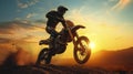 A Motocross Silhouette Soaring, Front Wheel Up, in a Display of Daring and Adventure