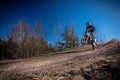 Motocross in wood track Royalty Free Stock Photo