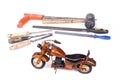 Motocycle made from wood with tools lik saw, file, hammer, chisel