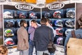Motopark-2015 (BikePark-2015). The exhibition stand of GSB shop. The Showcase with helmets. Visitors are choose a helmet. Royalty Free Stock Photo