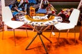 Motopark-2015 (BikePark-2015). Table with brochures near the exhibition stand. Royalty Free Stock Photo