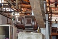 Motor and belt on machinery in an old cotton processing factory Royalty Free Stock Photo