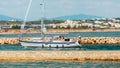 Motor boat entering the harbour in Lagos, Portugal