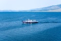 A motor boat on Lake Baikal on a summer morning. Royalty Free Stock Photo