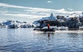 Motor boat sailing on the azure waters between the blue lagoon Royalty Free Stock Photo