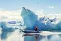 Motor boat sailing on the azure waters between the icebergs Royalty Free Stock Photo